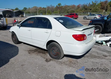 2004 Toyota Corolla Le z USA, uszkodzony, nr VIN JTDBR32E840052765